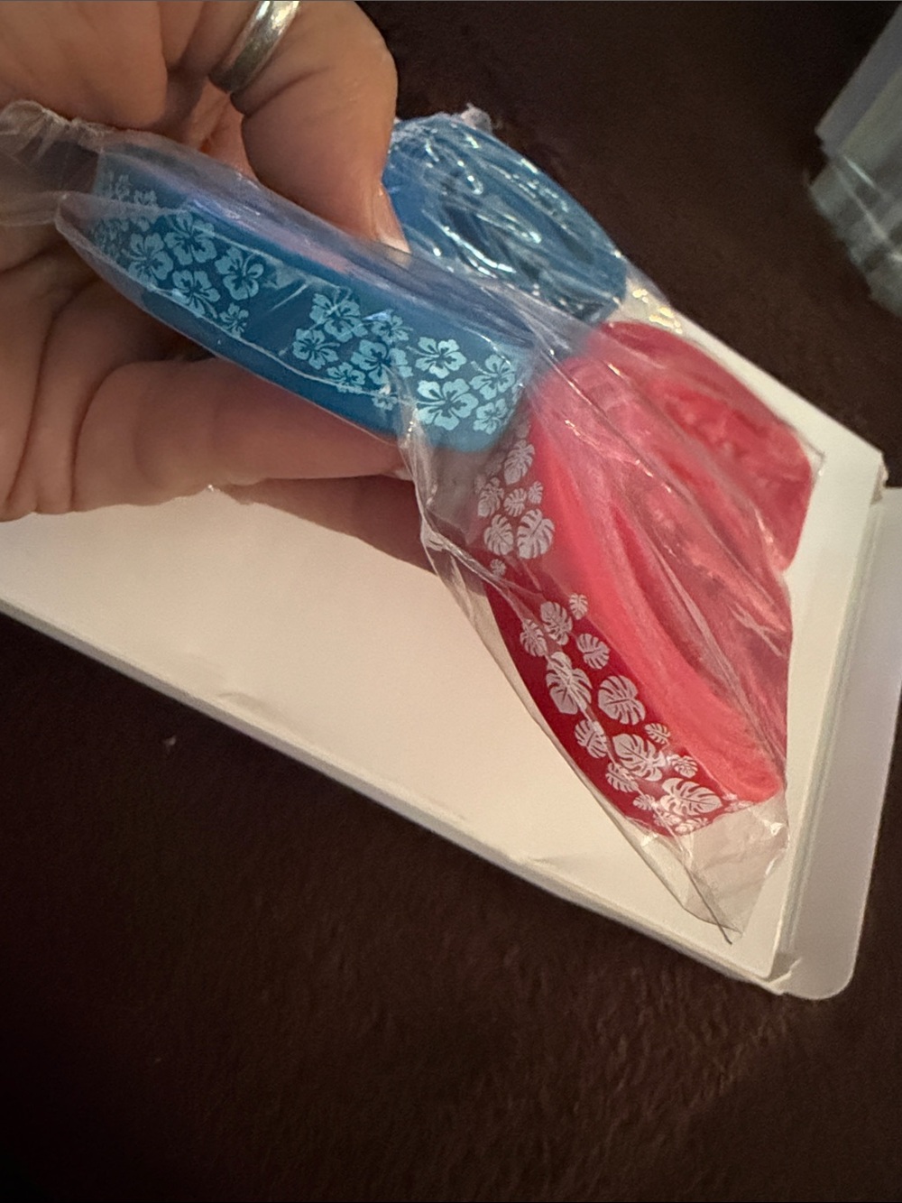 NEW set of 24 silicone Hawaiian themed bracelets (red & blue)